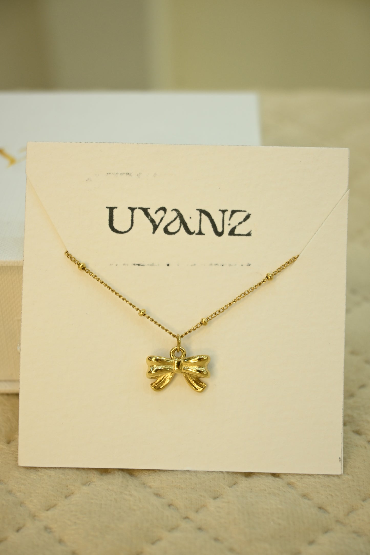 BOW PENDANT