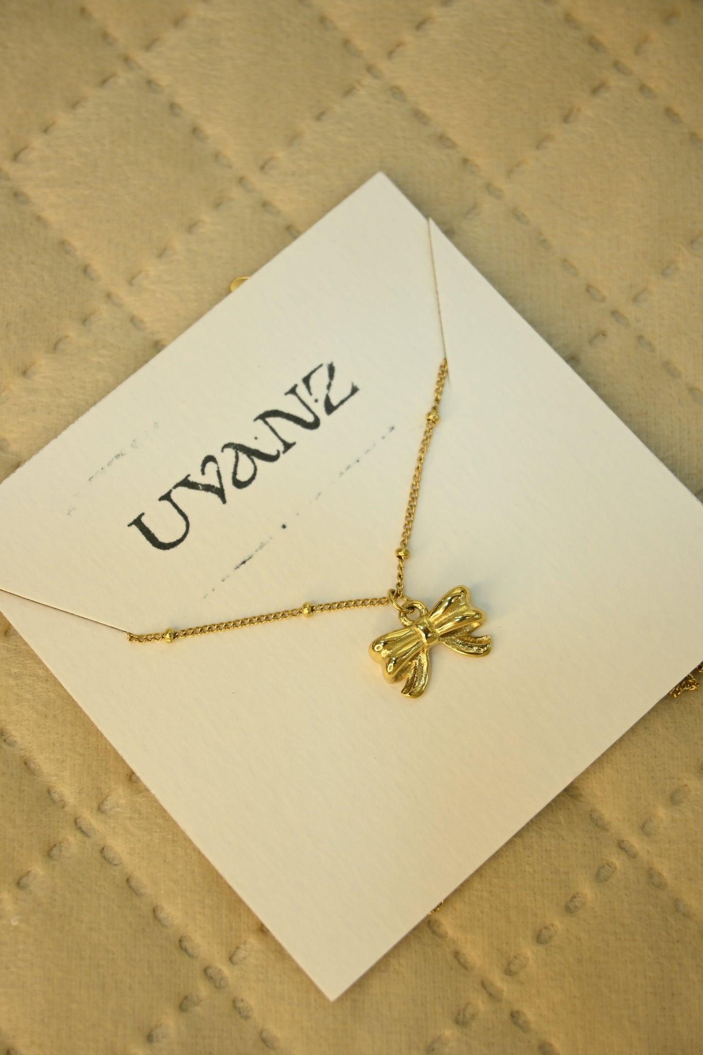 BOW PENDANT
