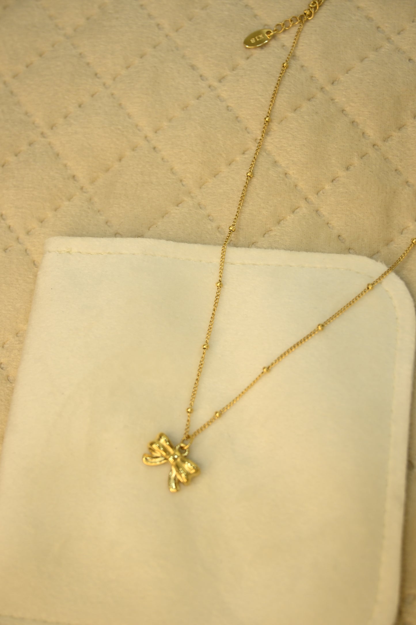 BOW PENDANT