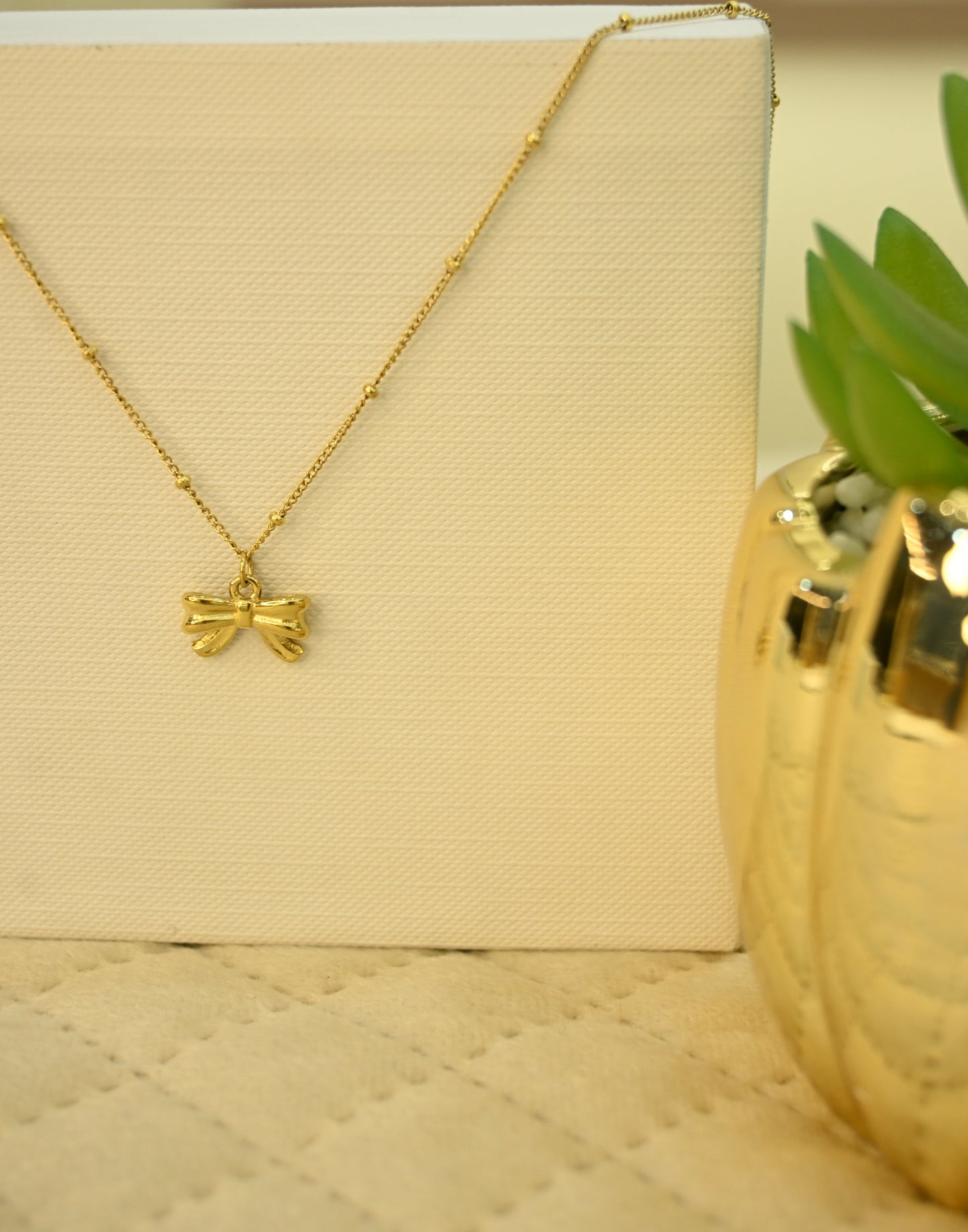 BOW PENDANT