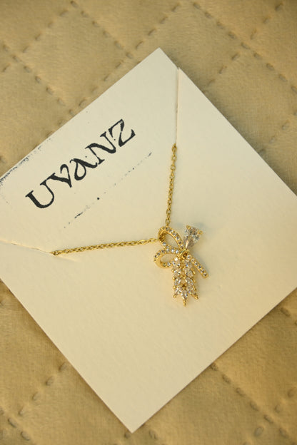 BOW & LEAF CRYSTAL PENDANT