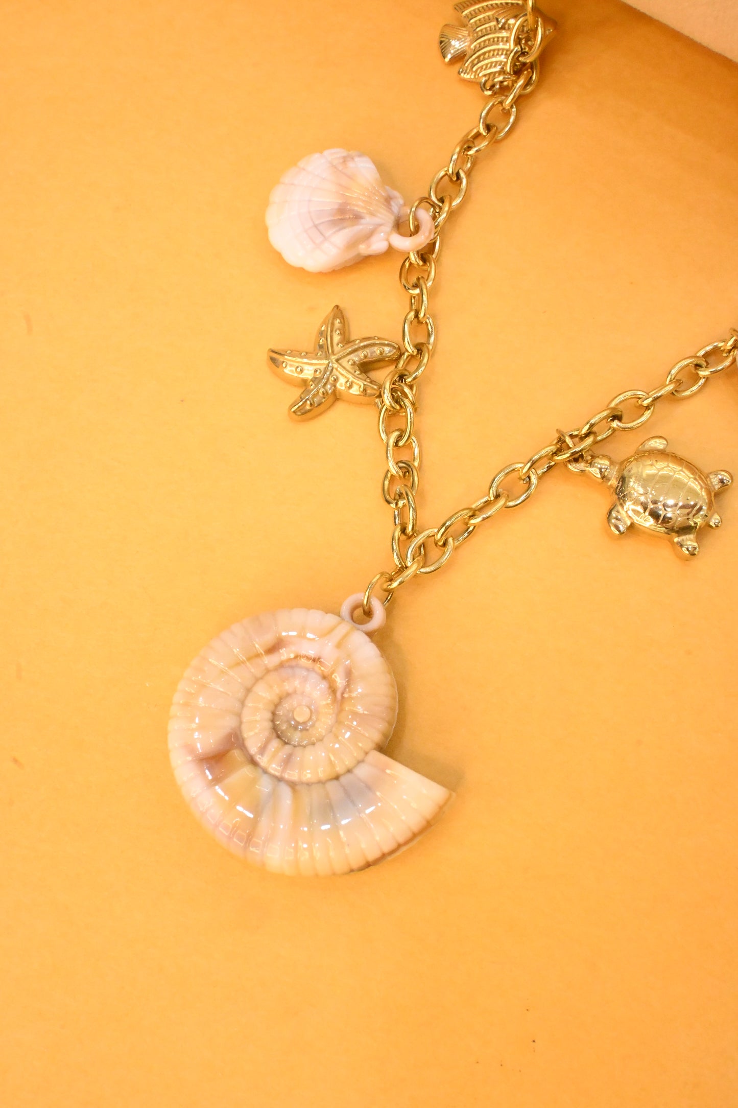 Necklace with shell & starfish charms
